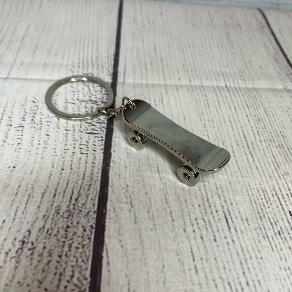 NWOT Silver Mini Skateboard Keychain Purse Charm w/Rolling Wheels